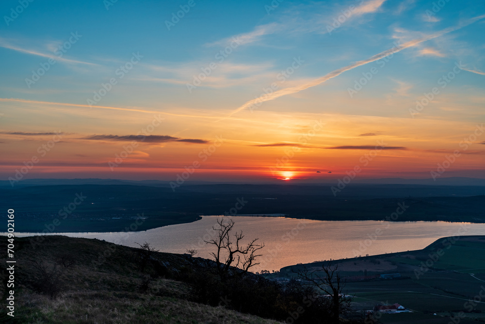 Sunrise above Nove Mlyny dam from Devin hill in Palava mountains in Czech republic