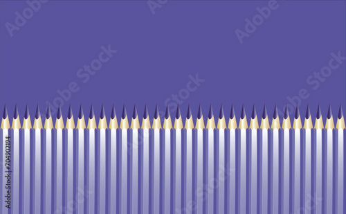 Realistic pencils, sharpened, purple, lined up to form a wall on a purple background. copy space.