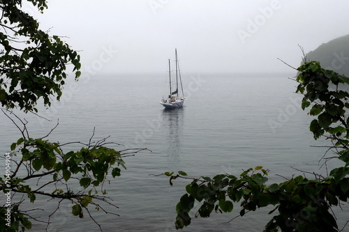 Sailing ship off the coast of the Bruce Peninsula in Peter the Great Bay of the Sea of Japan