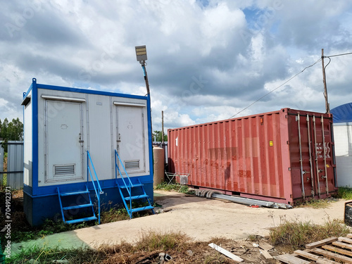 Принти на полотні Mobile toilets and the electrical equipment storage container in the substation