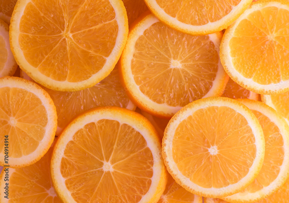 oranges cut into slices and laid out on the table as a food background 9 oranges cut into slices and laid out on the table as a food background 9