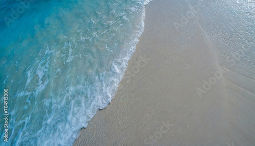 Soft wave on a sandy beach background, holiday and vacation concept