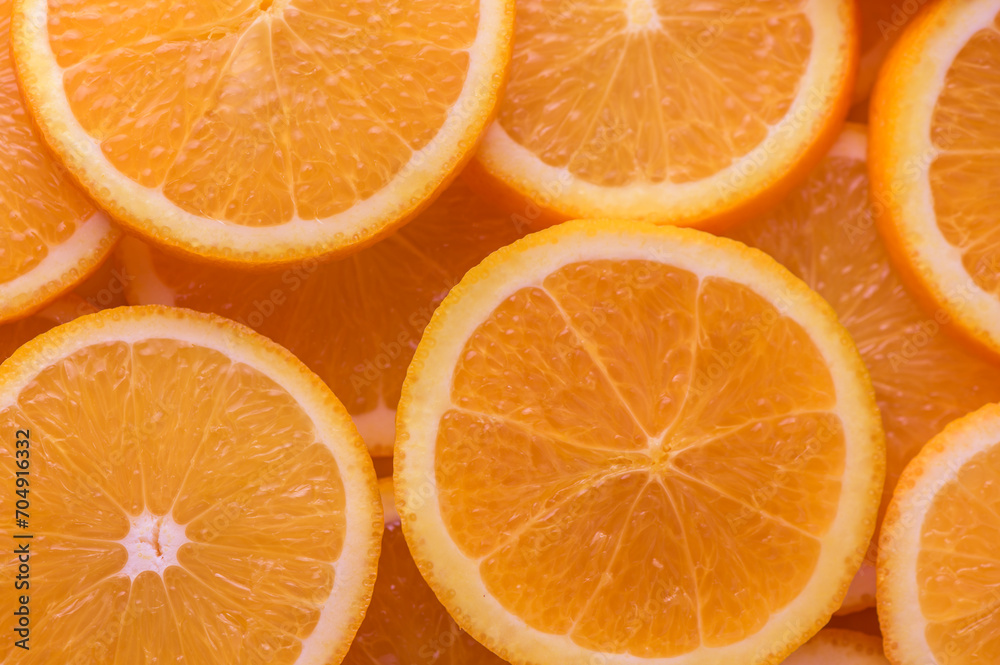 oranges cut into slices and laid out on the table as a food background 11 oranges cut into slices and laid out on the table as a food background 11