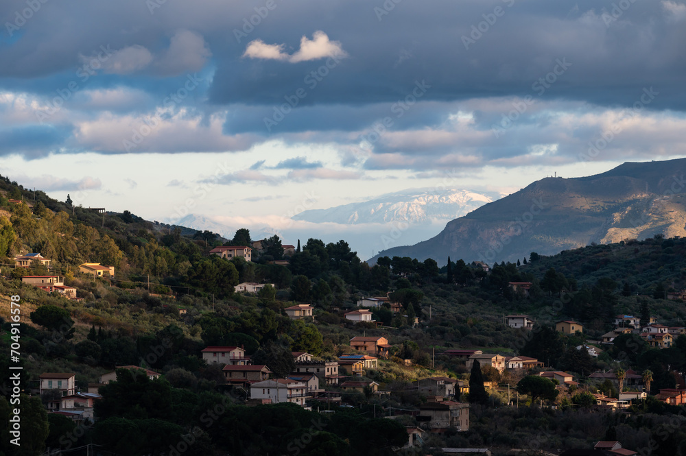 Remote landscape view at the Monte di Palermo over green hills and villages around Gibilrossa, Italy
