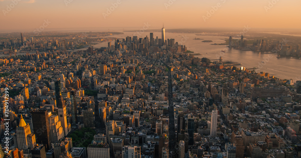 Aerial View of Lower Manhattan Architecture. Panoramic Shot of Wall Street Financial Business District from a Helicopter. Scenery of Historic Office Buildings and Skyscrapers in New York City 
