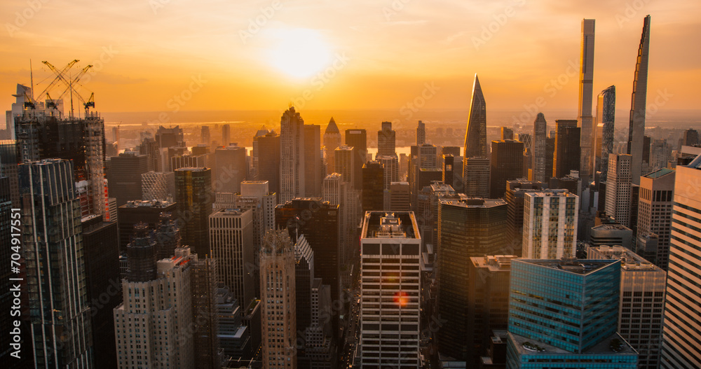 Urban Sunset Scenery with Midtown Manhattan. Historic and Modern New York City Skyscrapers, New Building Under Construction. Aerial View of a Popular American Travel and Business Destination