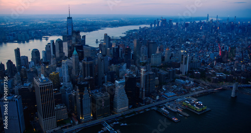 Cinematic Aerial Evening Shots Capturing New York City Skyscrapers. Panoramic Helicopter Fly-By Over the Roofs and Spires of Historic Urban Architecture in Wall Street Financial District