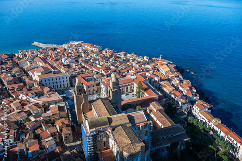 High angle view over the bay, blue sea and village of Cefalu, Italy