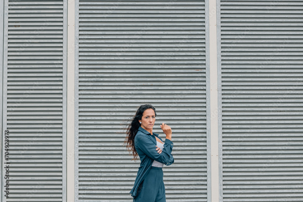 portrait of business woman or executive on the street