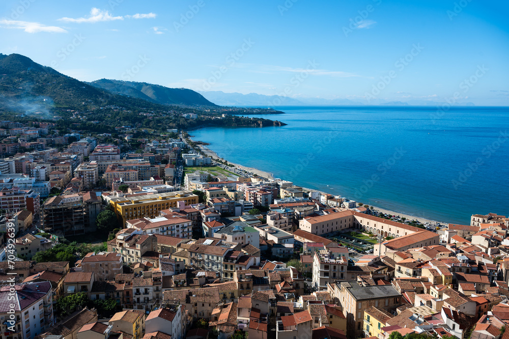 High angle view over the bay, mountains and village of Cefalu, Italy