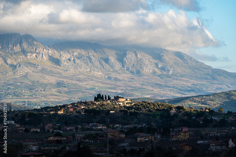 Remote village houes, a green valley and the mount Pellegrino , Gibilrossa, Sicily, Palermo
