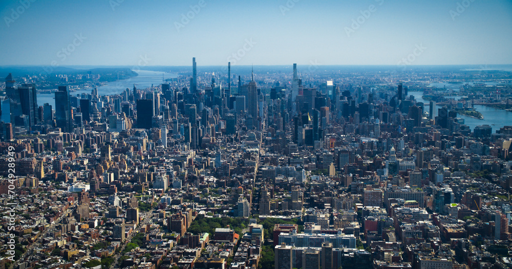 Scenic Aerial New York City View Towards Lower Manhattan Architecture. Panoramic Photo of Midtown Financial District from a Helicopter. Cityscape with Office Buildings and Skyscrapers