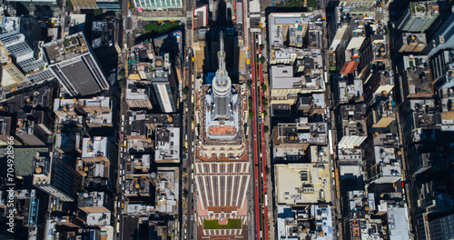 Aerial Footage of New York City and Manhattan Panoramic Skyline with Iconic Empire State Building. Helicopter View of the Cityscape from Above with Towering Tourist Attraction