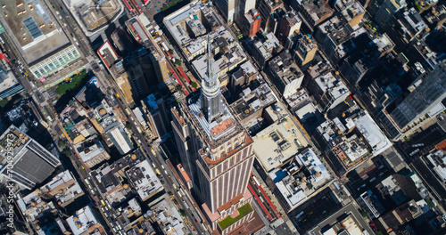 Panoramic Aerial Shot Around the Top of the Empire State Skyscraper in New York City. Helicopter View of the Spire, Viewing Platform with Tourists, Indoors Top Deck Observatory  © Gorodenkoff