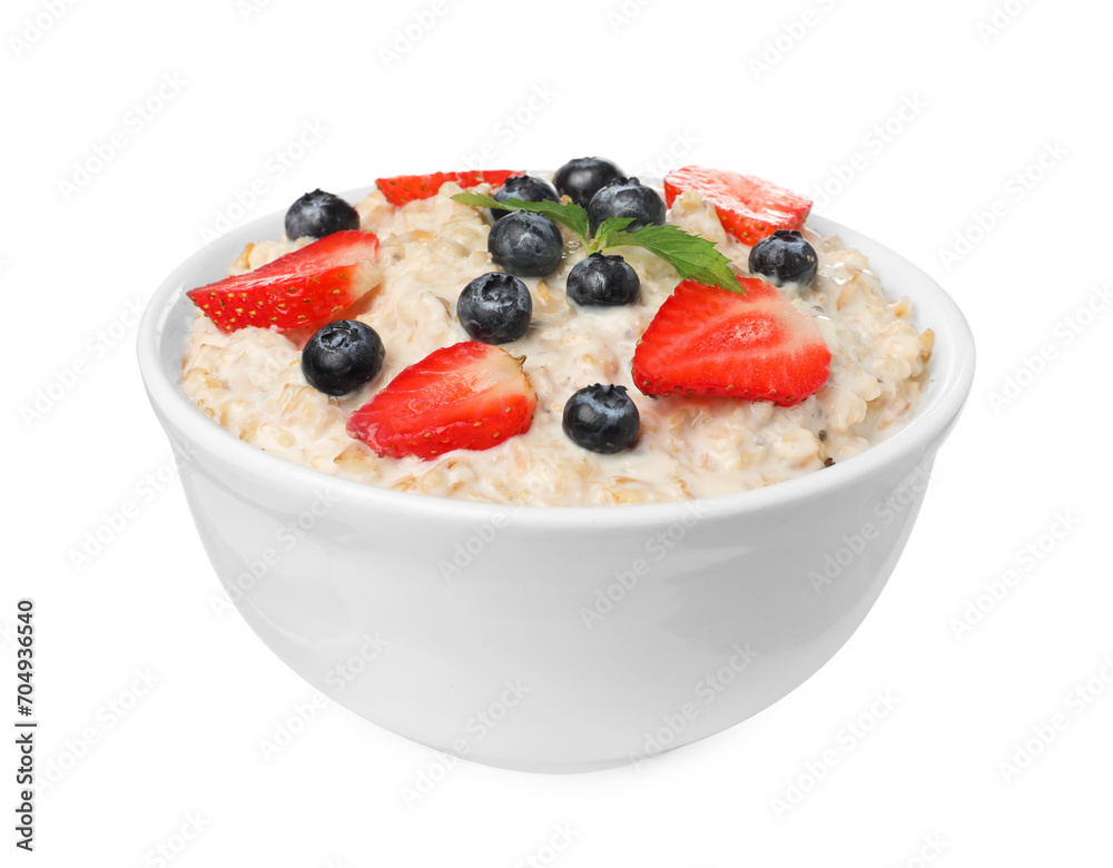 Tasty boiled oatmeal with berries in bowl isolated on white Tasty boiled oatmeal with berries in bowl isolated on white