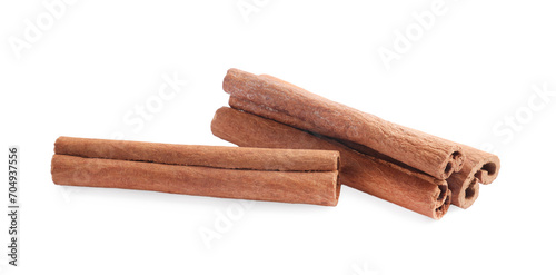 Pile of aromatic cinnamon sticks isolated on white
