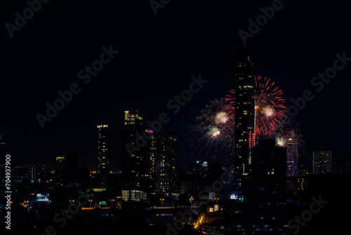 The blurred background of fireworks (light trails) is beautiful at night, seen in the New Year holidays, Christmas events, for tourists to take pictures during public travel.