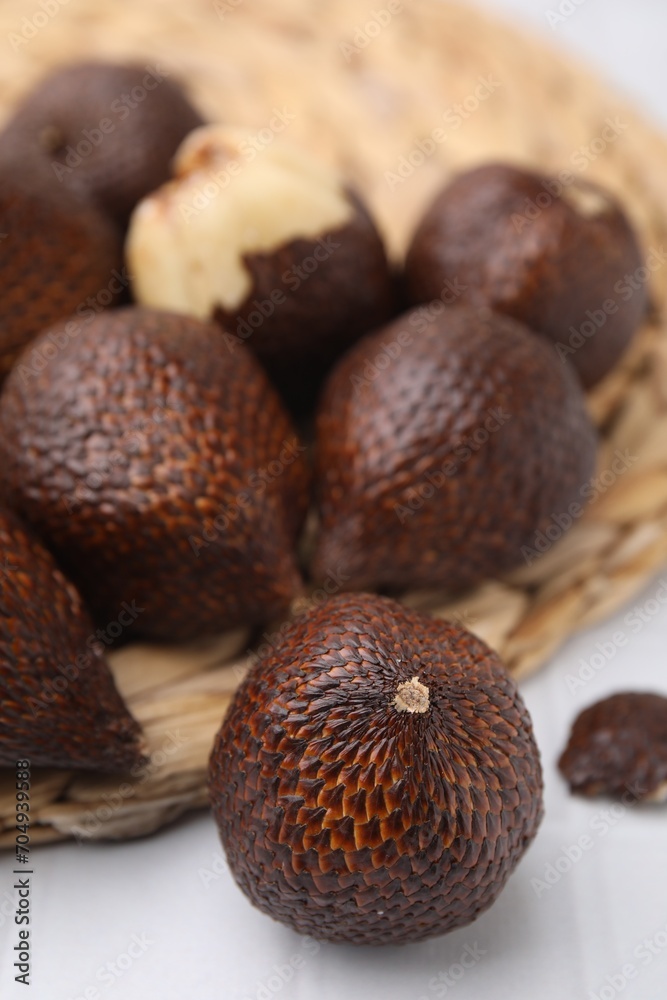 Many fresh salak fruits on white table, closeup Many fresh salak fruits on white table, closeup