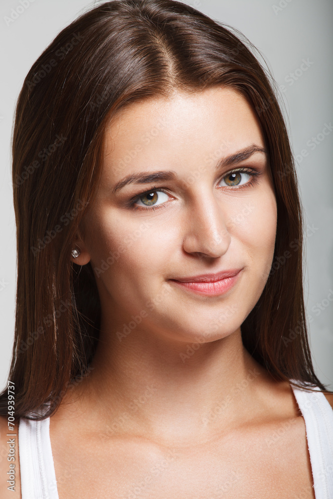Portrait of a young smiling girl