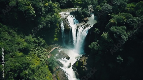 background of a beautiful waterfall in a tropical forest