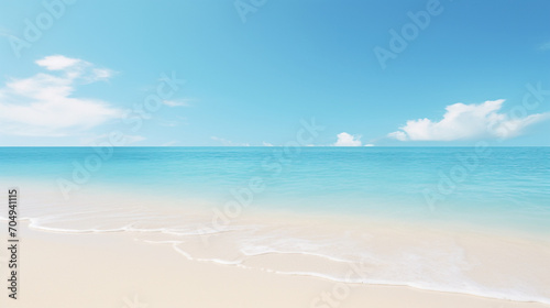 Sandy Beach and Clear Blue Sky A relaxing background of a sandy beach with a clear blue sky, perfect for travel agency websites, summer product advertisements, or coastal decor