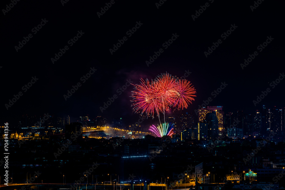 The blurred background of fireworks (light trails) is beautiful at night, seen in the New Year holidays, Christmas events, for tourists to take pictures during public travel.