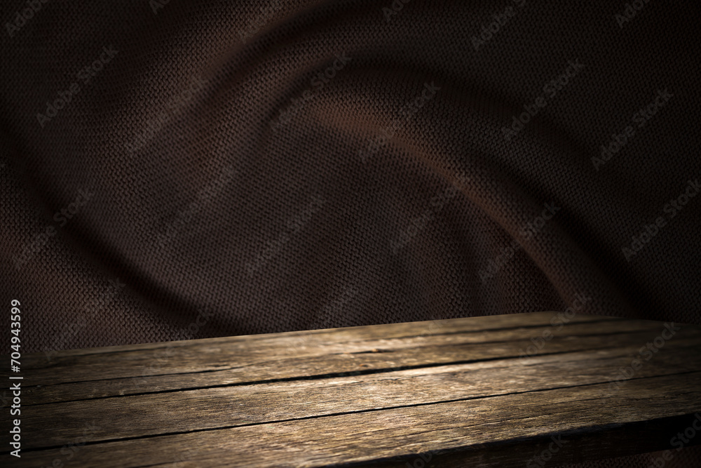 empty wooden table with dark background