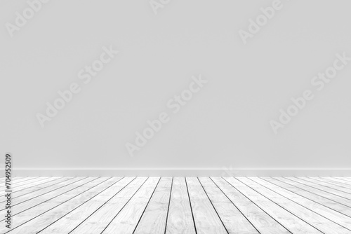 Minimalistic interior of an empty room with wooden parquet floor and gray wall.
