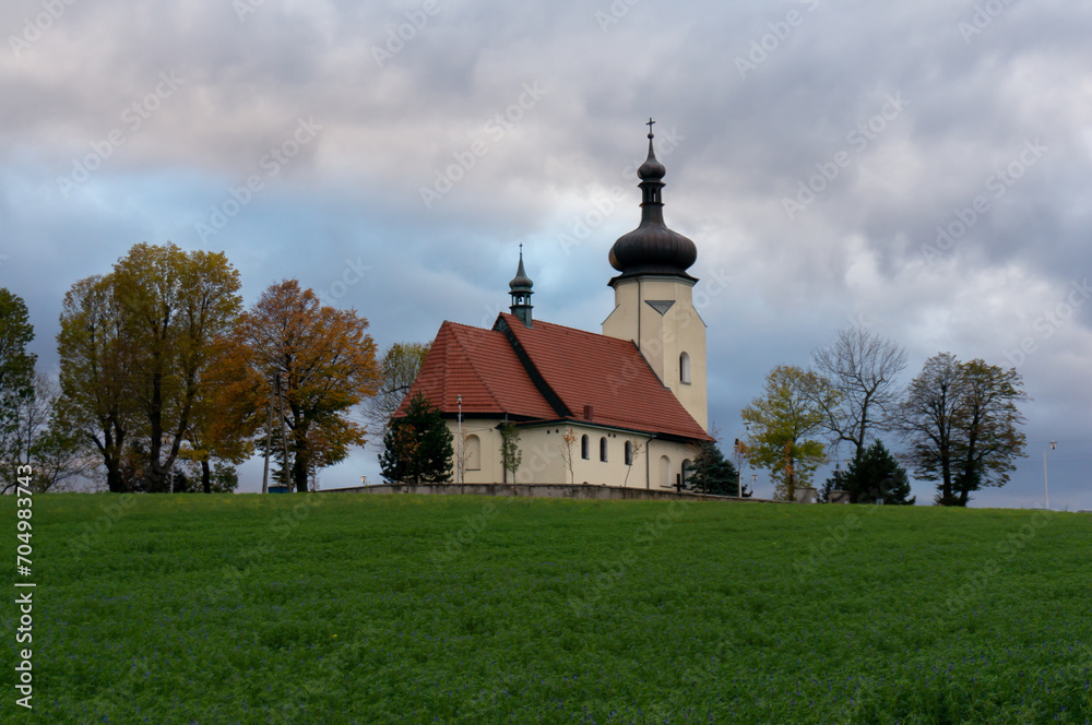 Church of Saint Clemens (kościół świętego Klemensa) on Klimont Hill. Temple is depicted in coat of arms of the town. Lędziny, Poland.