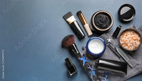 A flat lay arrangement featuring men's grooming products on a colored background, leaving room for design elements.