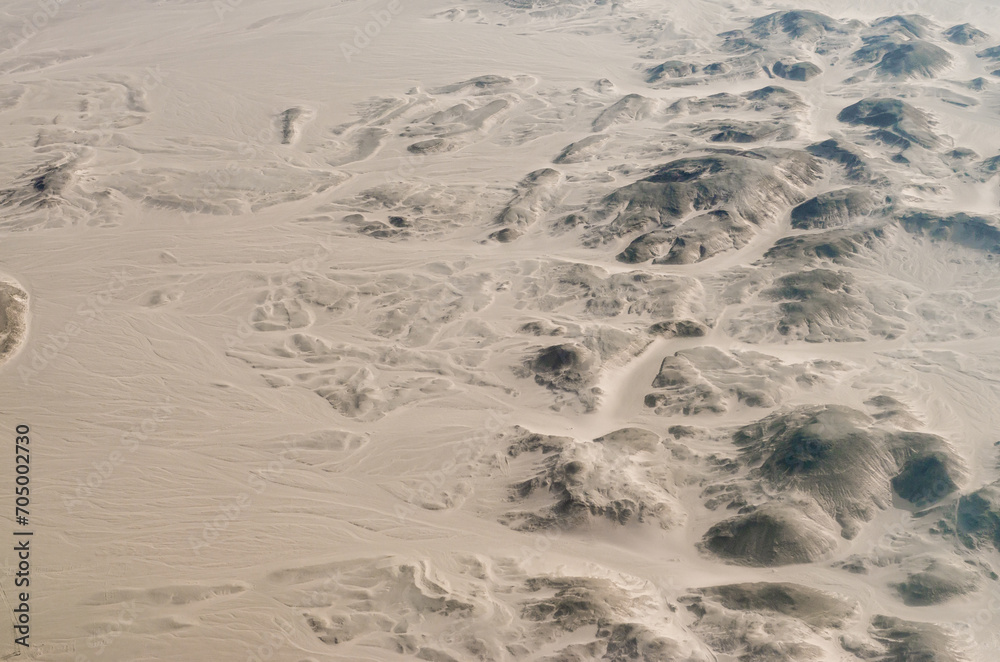 view from the plane window of the desert in Egypt