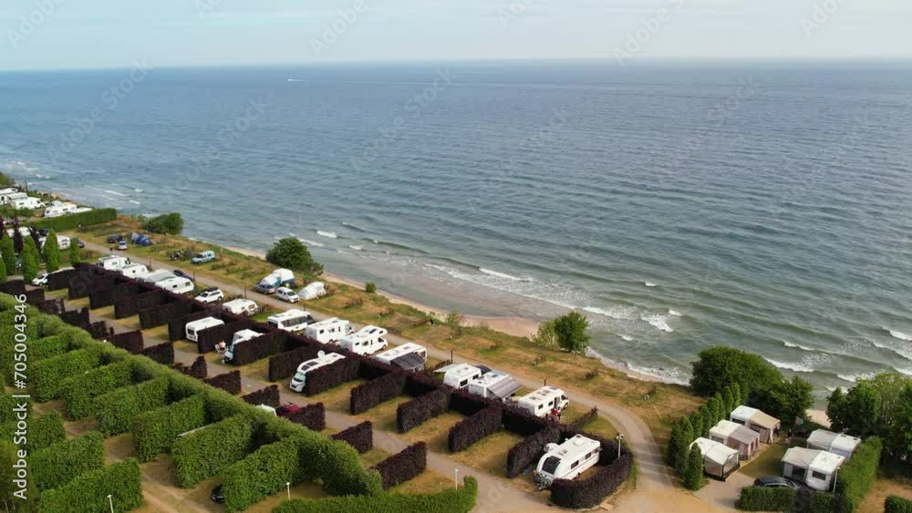 Campsite by the sea on the cliff, aerial view. Picturesque situated