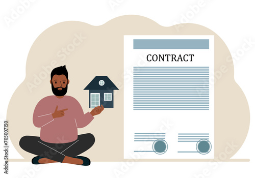 A man on the boat holds a house nearby a big contract. Real estate transaction concept, purchase, sale, rent or rental house.