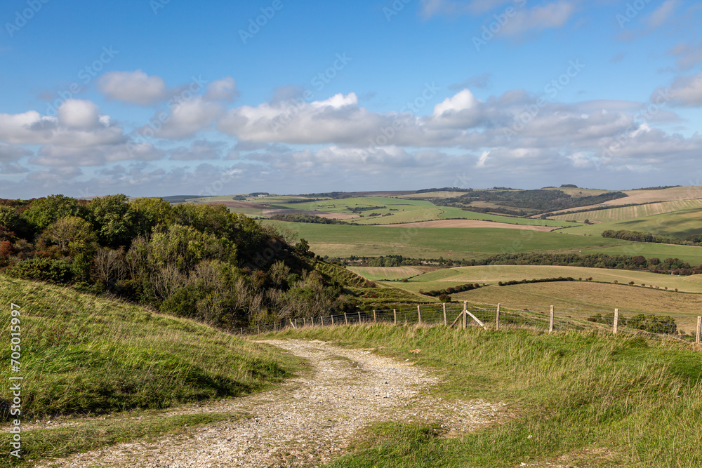 A pathway leading down from Kingston Ridge in the South Downs, on a sunny September day