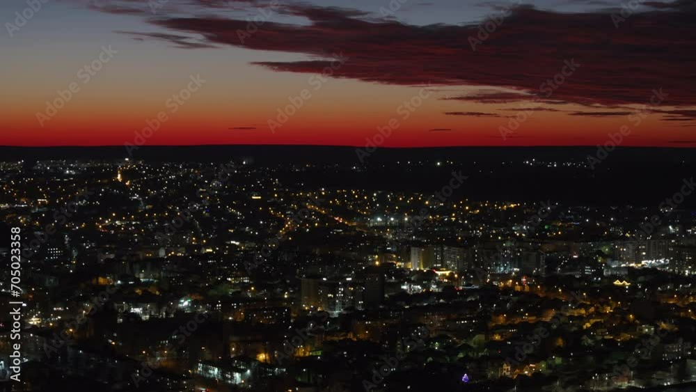Aerial drone view of Chisinau city at sunset, blue hour with red sky. Moldova Aerial drone view of Chisinau city at sunset, blue hour with red sky. Moldova