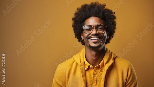 Portrait of smiling african american man in eyeglasses on yellow background. Generative Ai © Alexandra