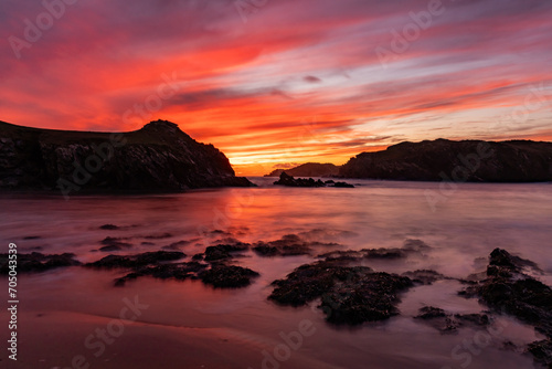 Fototapeta Naklejka Na Ścianę i Meble -  Sunset at Porth Dafarch Beach, Isle of Anglesey, Uk