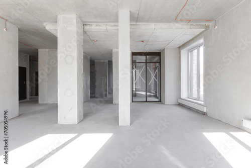 interior of the apartment without decoration in gray colors. rough finish