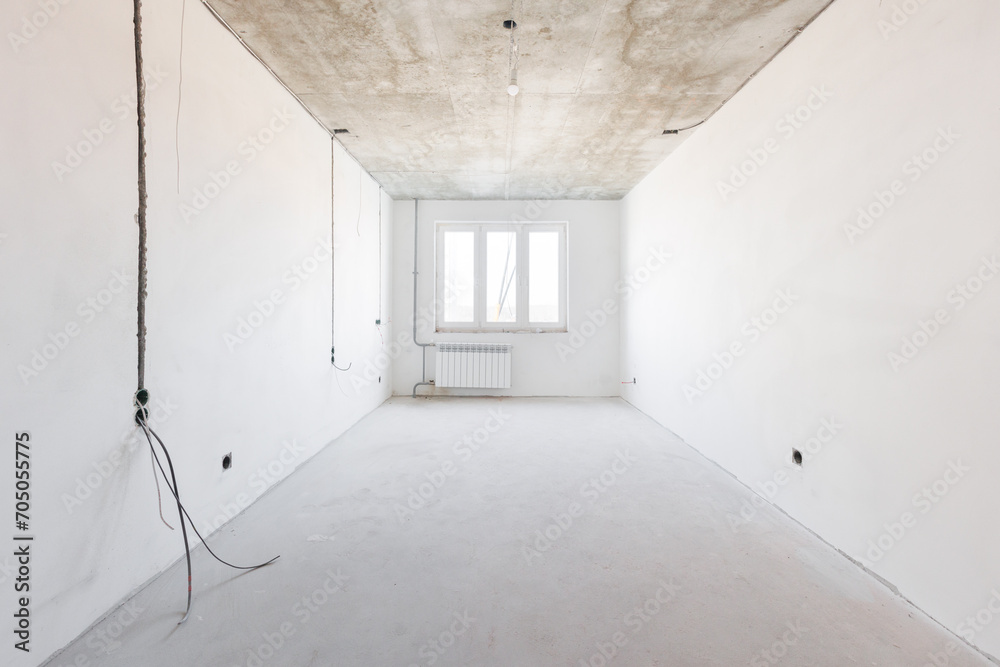 interior of the apartment without decoration in gray colors. rough finish interior of the apartment without decoration in gray colors. rough finish