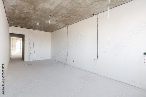 interior of the apartment without decoration in gray colors. rough finish