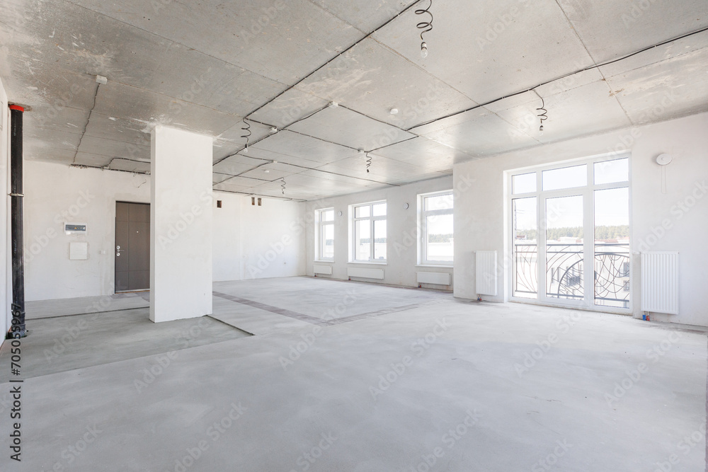 interior of the apartment without decoration in gray colors. rough finish interior of the apartment without decoration in gray colors. rough finish