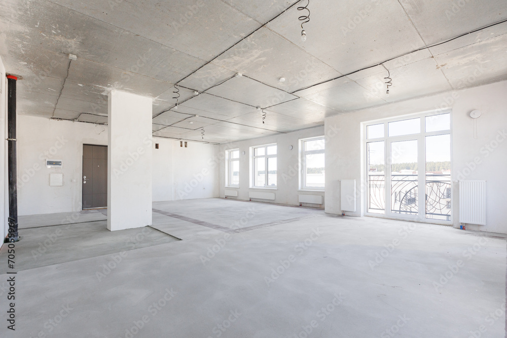 interior of the apartment without decoration in gray colors. rough finish