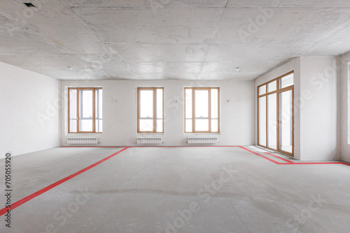 interior of the apartment without decoration in gray colors. rough finish