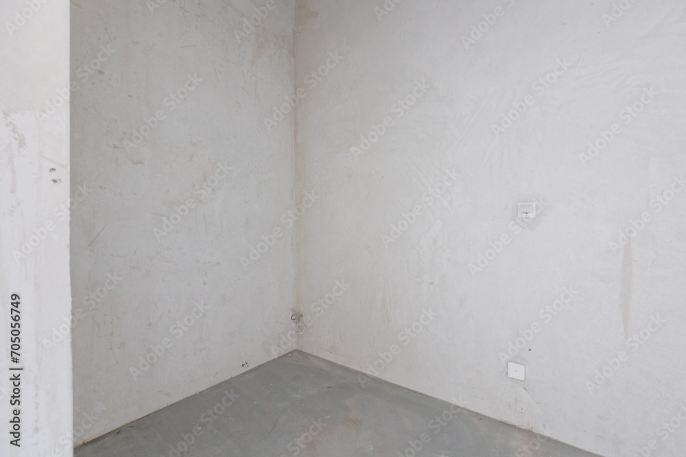 interior of the apartment without decoration in gray colors. rough finish interior of the apartment without decoration in gray colors. rough finish