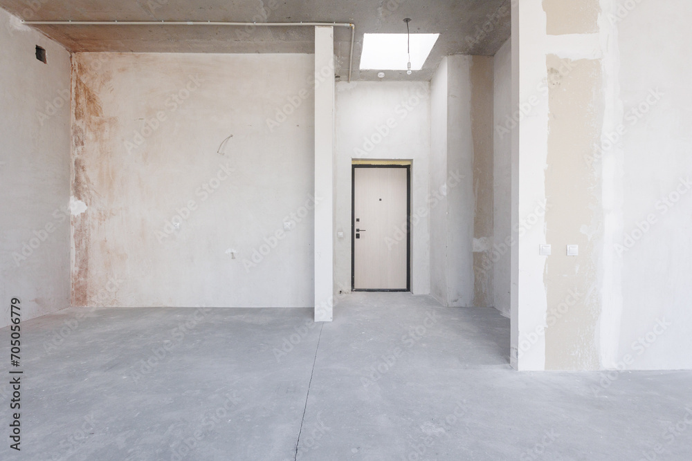 interior of the apartment without decoration in gray colors. rough finish interior of the apartment without decoration in gray colors. rough finish