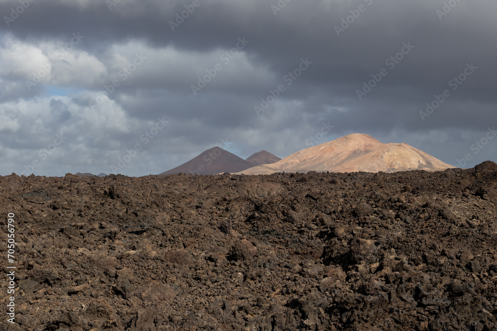 Lava soil and a mountain, Lanzarote, Spain