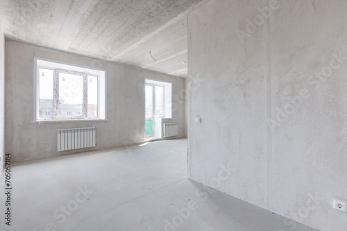 interior of the apartment without decoration in gray colors. rough finish © gluschenkoart