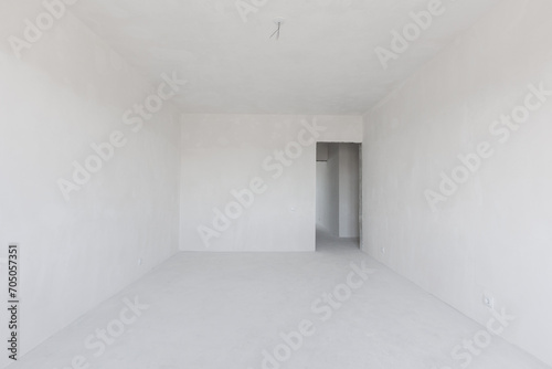 interior of the apartment without decoration in gray colors. rough finish