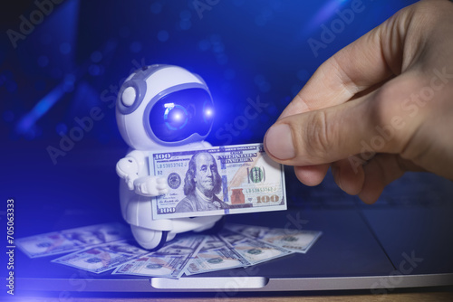 Real robot give dollars money for people. Salary concept. Modern digital technology concept. Artificial intelligence as an aid in making money. Business development. photo