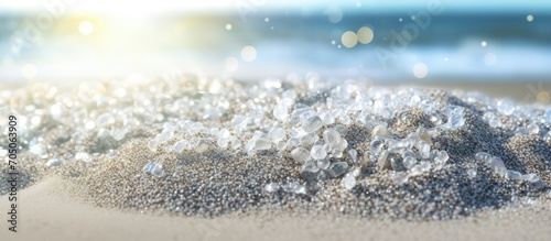 Sparkling white beach sand background, Beach nature and summer sea water with sunlight